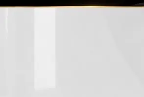 Close detail of the DB Homés White Gloss PVC wall panel surface